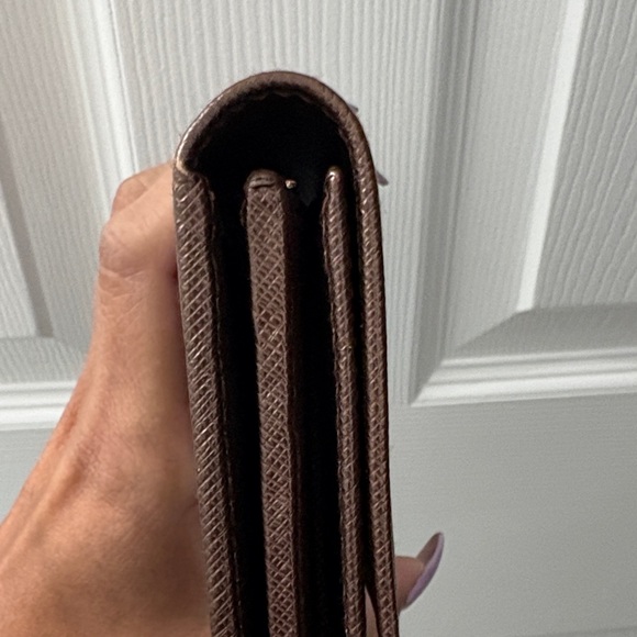 Salvatore Ferragamo Gancini Continental Wallet. - Picture 13 of 16